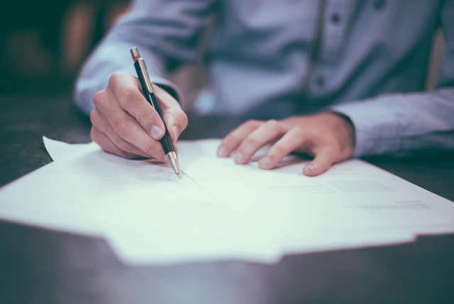 Case documents being reviewed and signed